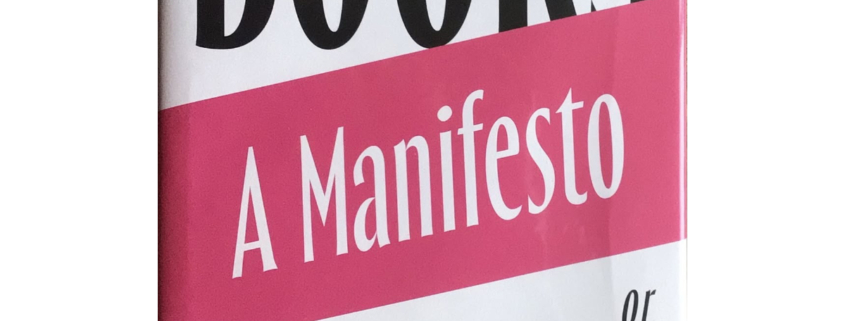 Image taken of a book with the title A Manifesto, or, How to Build a Library, by Ian Patterson