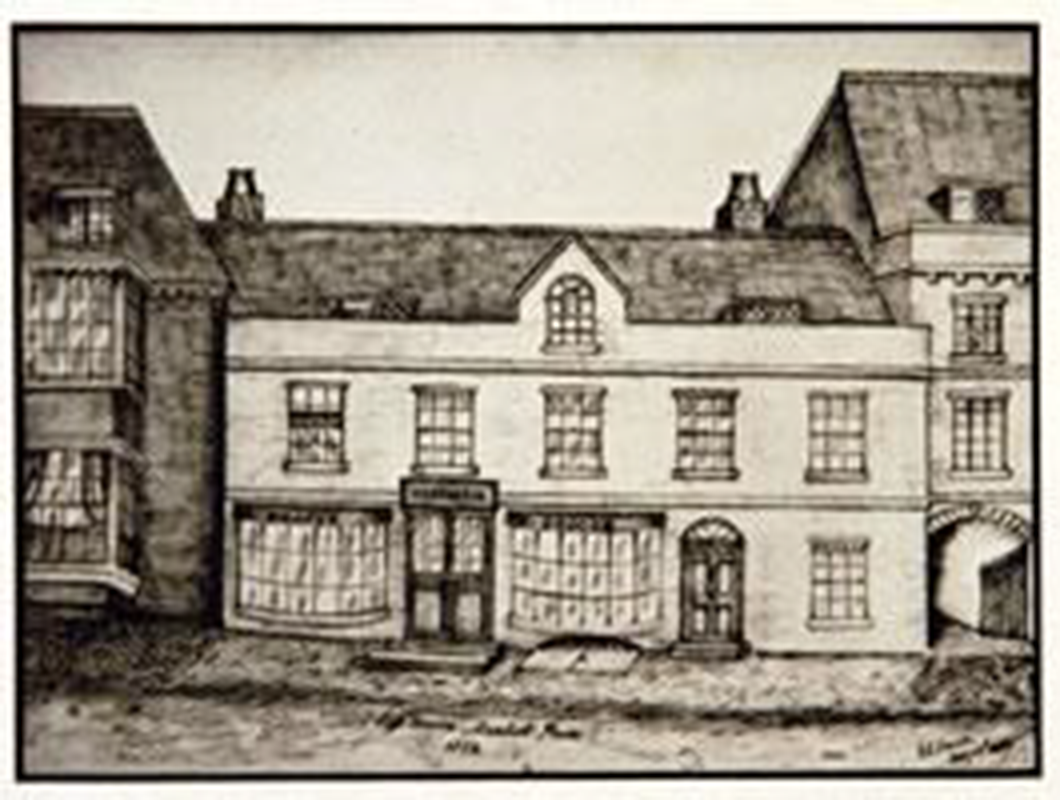Picture of a building in Market Place, one of the first buildings used by the Institution, (from a drawing of Wiseman’s drapery and grocery shop made by Frank E. Emson).