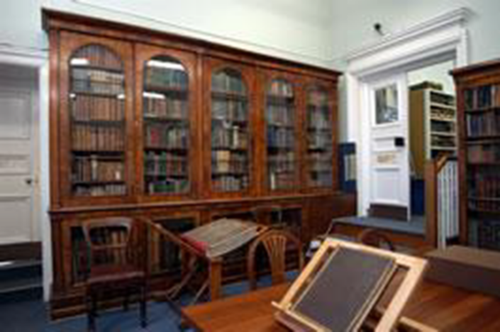 These are the original bookcases owned by George Stacey Gibson and given to the library with his personal collection of books.