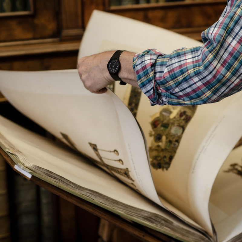 image of a big book with pictures across the pages.