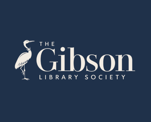 Square boxed navy logo beside text that reads “The Gibson Library Society” in elegant serif lettering with a heron on the left side of the text