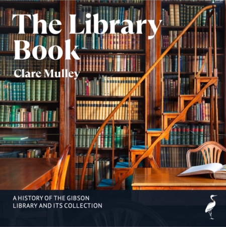 Book cover for *The Library Book* by Clare Mulley, showing a grand wood-paneled library, bookshelves, rolling ladder, desk, and open book.