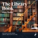 Book cover for *The Library Book* by Clare Mulley, showing a grand wood-paneled library, bookshelves, rolling ladder, desk, and open book.